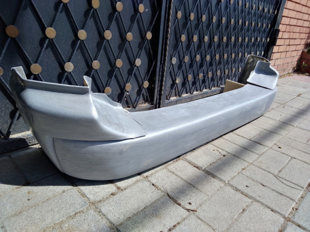 Силовой бампер задний стеклопластиковый (в сборе) на Mitsubishi Pajero Sport I купить недорого с доставкой в Убинское